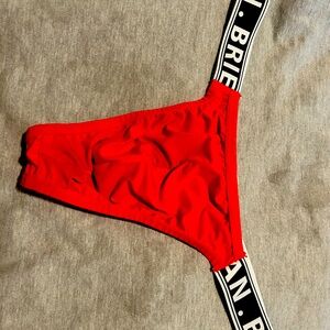 Sexy men’s thongs. New without tags.  Lot of 2. Rad and black